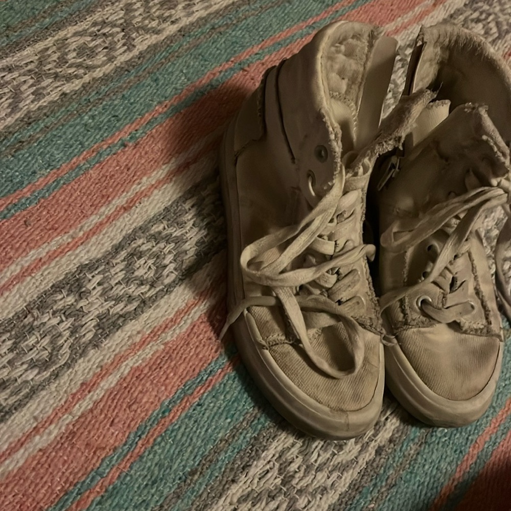 These shoes are used you can probably tell they are supposed to be white
